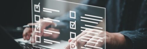 Man,Using,Laptop,Questionnaire,With,Checkbox,,Survey,Form,Online,,Answer