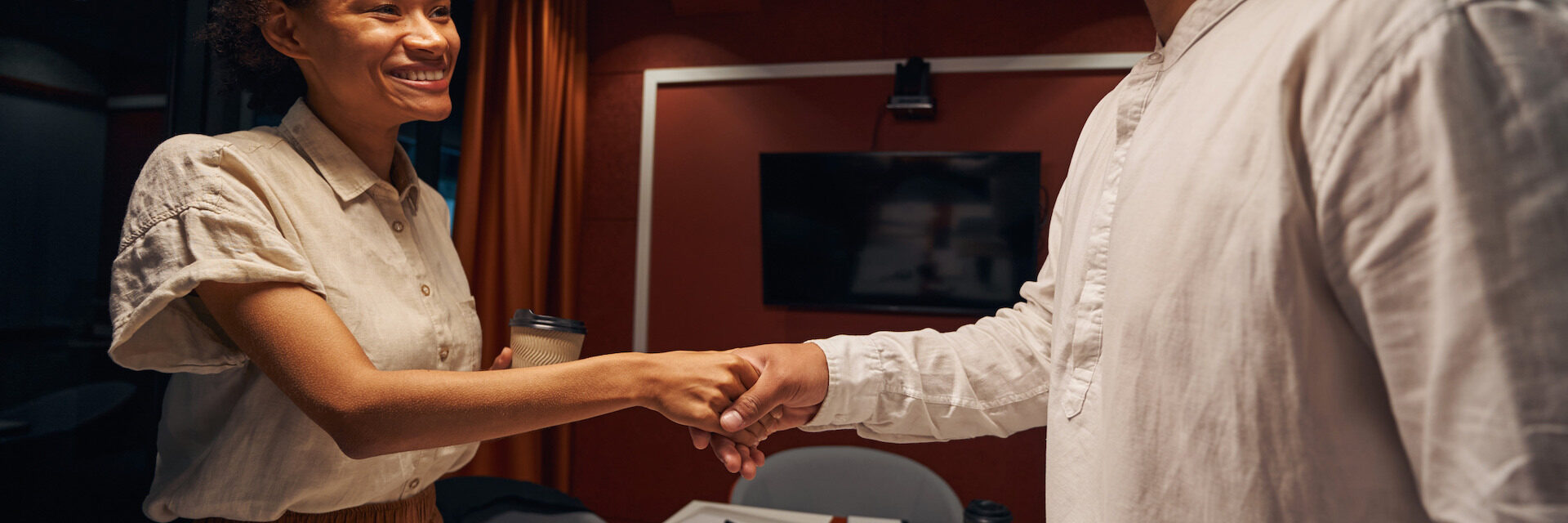 American employee is shaking hands with colleague