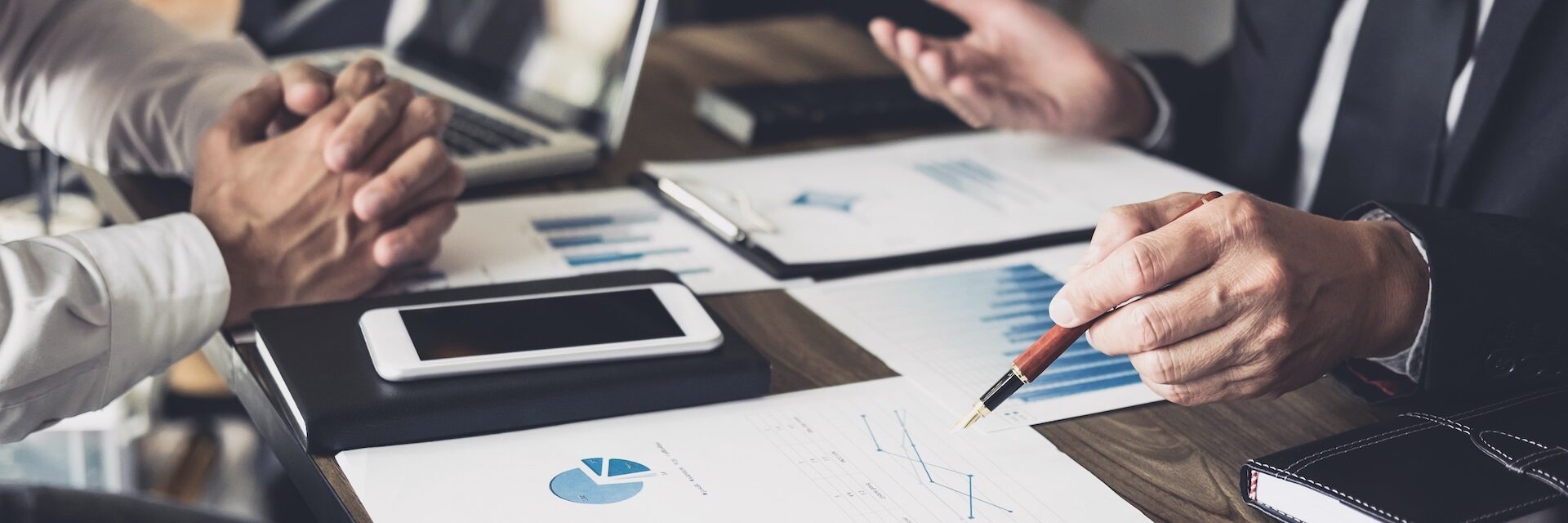 Co working conference, Business team meeting present, investor colleagues discussing new plan financial graph data on office table with laptop and digital tablet, Finance, accounting, investment